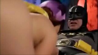 Batman beijando